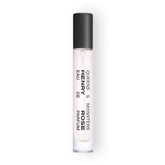 Henry Rose Queens & Monsters travel spray on wrist for on-the-go fragrance touch-ups.
