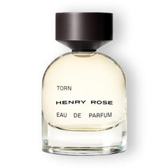 Henry Rose Torn bottle with vanilla, freesia, and jasmine for everyday versatility.