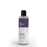 Her Fantasy Box Refresh bottle pouring for a gentle cleanse
