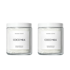 HERBIVORE Coconut Milk Bath Soak bottle ready for a hydrating soak that smooths skin.