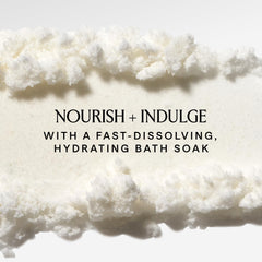 HERBIVORE Coconut Milk Bath Soak creamy texture close-up suggests skin-softening potential.
