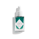 Herbivore Lapis Facial Oil bottle on a clean surface, calming redness and balancing skin.