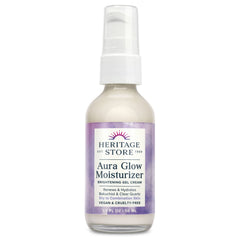 HERITAGE STORE Aura Glow bottle on a clean vanity promotes hydrated, radiant skin.