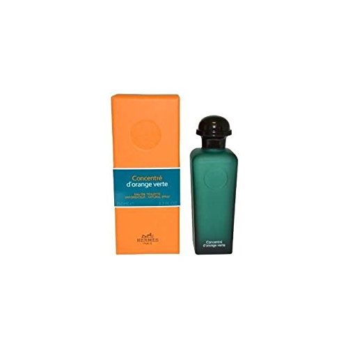 Hermes Concentre D'Orange Verte bottle pour showing fresh citrus and green notes
