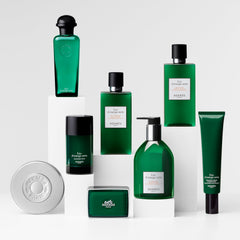 Hermès Eau d'Orange Verte shower-usage image suggests fragrance layering during daily cleansing