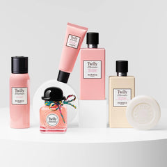 Hermès Twilly fragrance-lather closeup showing light perfume finish and cleansing use