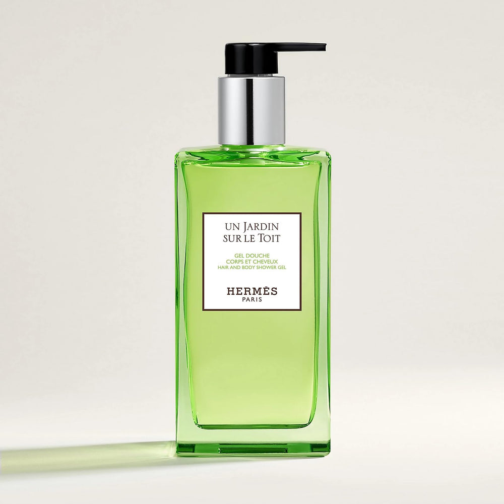 Hermès Un Jardin Sur Le Toit shower gel bottle front shows premium design and refillability.
