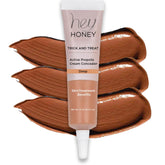 Hey Honey Trick & Treat Concealer bottle close-up showing natural coverage and hydration.