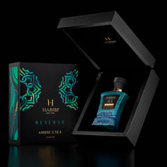 H HABIBI Ambre Of The Sea cap close-up, bergamot and sea salt notes on display.