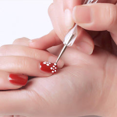 HiMo nail art dotting tool in action for delicate details.