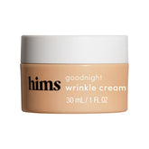Hims & Hers Goodnight Wrinkle Cream bottle close-up for overnight hydration.