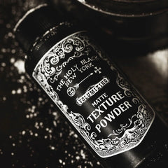 HOLY BLACK powder used to set makeup for lasting finish