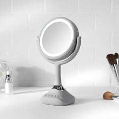 Home NetWerks 76-101-BT mirror with USB charging port keeps devices powered.