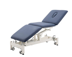 HomelyD electric treatment table height adjustment enables ergonomic therapist access.