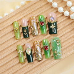 Homsera cross design nails with gold accents for special occasions.