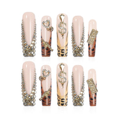 Homsera gilded wild spot nails with metallic print for nightlife flair