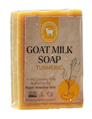 Honey Sweetie Acres turmeric goat milk soap bar closeup showing creamy lather and luxurious texture.