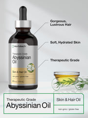 Horbäach Abyssinian Oil hair-application scene suggests smoothing and frizz control