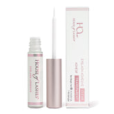 House of Lashes glue bottle closeup shows latex-free formula for sensitive eyes.