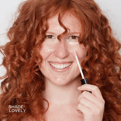 Close-up of How to Be a Redhead Finally Bright Concealer creamy texture highlighting moisturizing formula.
