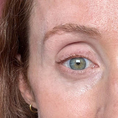 Under-eye application shot shows seamless blend.