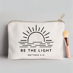 HubbgDesign Be The Light brass zipper detail for secure, smooth access.
