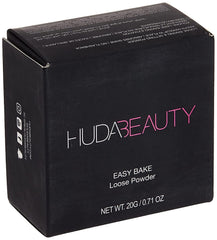Huda Beauty Easy Bake Cupcake powder jar shows velvety texture for flawless setting.