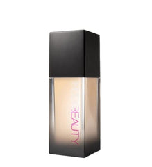 Huda Beauty FauxFilter Luminous Matte Foundation bottle in Panna Cotta offers full coverage base.