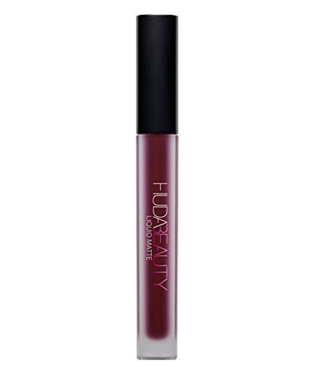 Huda Beauty Liquid Matte Lipstick Famous closeup shows rich pigment for bold color