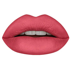 Huda Power Bullet Honeymoon on lips for precise, full-coverage color in a single swipe.