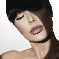 HUDA BEAUTY Power Bullet Matte Lipstick throwback application demonstrates precise, comfortable matte finish.