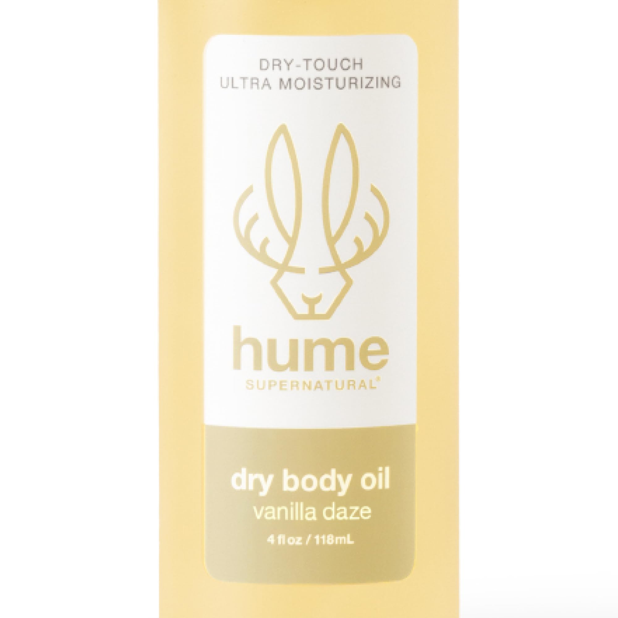 HUME SUPERNATURAL Dry Body Oil Spray Vanilla Daze bottle for radiant skin hydration.