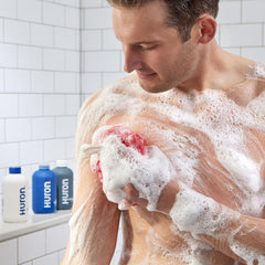 Huron Coconut Oil ingredient close-up emphasizing skin hydration benefits.