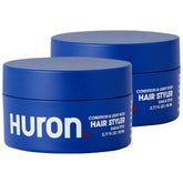 Huron Clean Citrus Woods hair styler jar close-up highlights lightweight hold and conditioning.