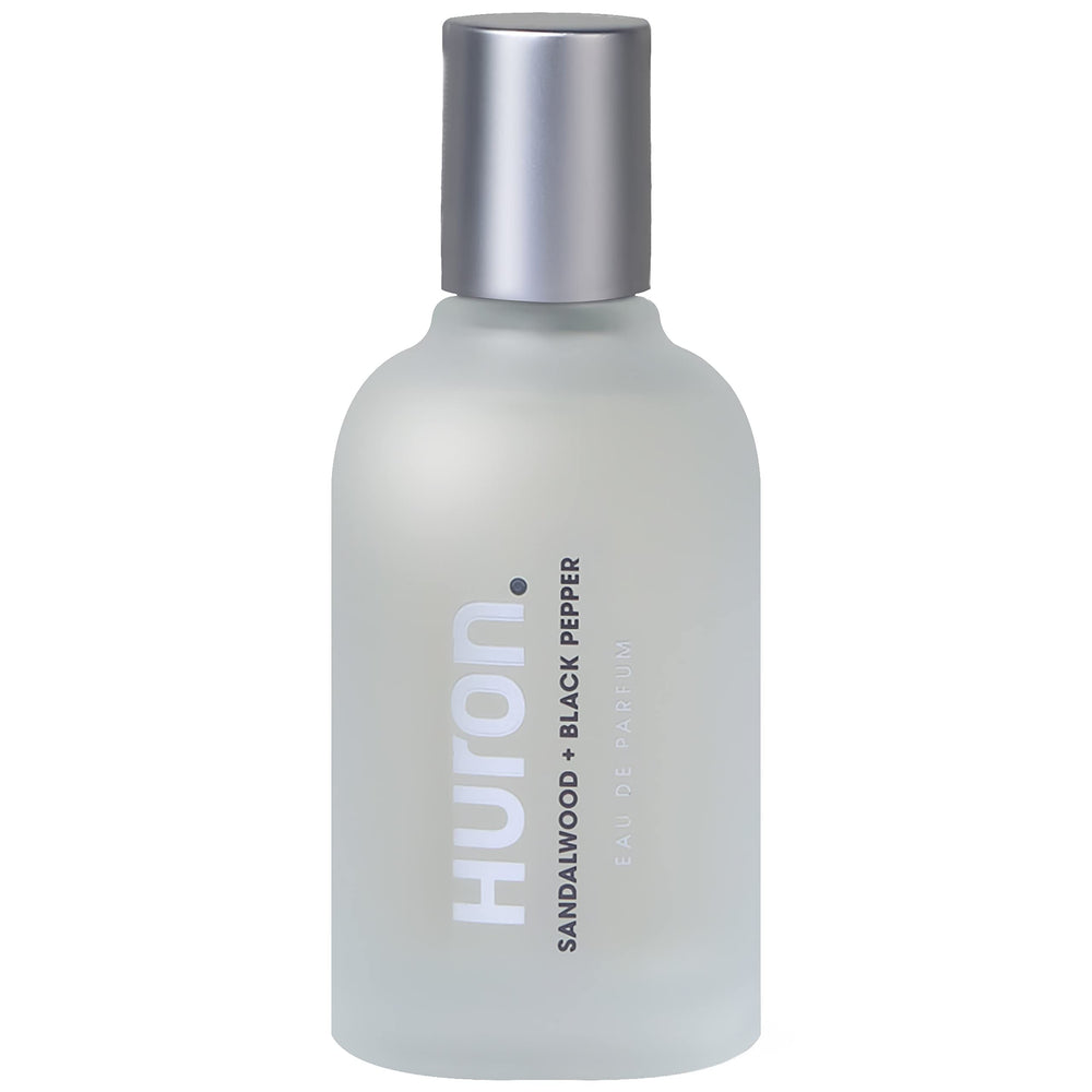 Huron men's cologne bottle front view with long-lasting woody notes for daily wear