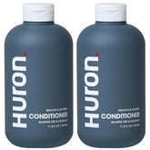 Huron Men’s Conditioner bottle front highlights lightweight hydration for frizz control.