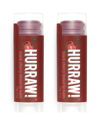 Hurraw! Black Cherry tinted lip balm packaging showing organic ingredients for vegan care.