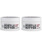 Hustle Butter Deluxe tattoo balm jar close-up for soothing aftercare.