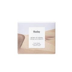 Huxley Secret of Sahara anti-gravity cream texture swipe shows melting balm feel.
