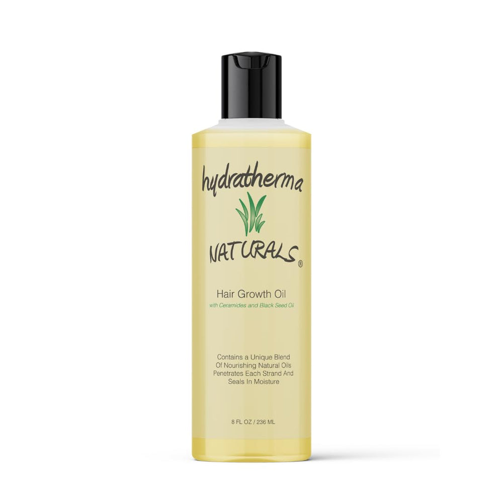 Hydratherma Naturals Hair Growth Oil bottle pouring for lightweight scalp hydration