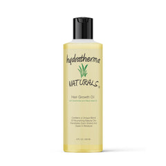 Hydratherma Naturals Hair Growth Oil bottle pouring for lightweight scalp hydration