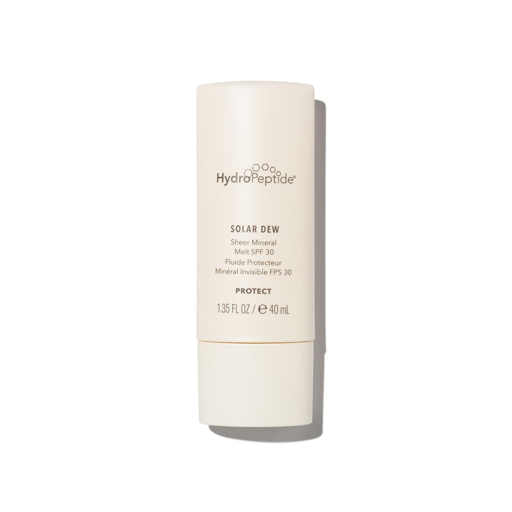 HydroPeptide Solar Dew Mineral Melt bottle on desk showing weightless mineral SPF protection