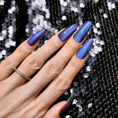Hypnaughty color-shift cat eye nails offer depth under light.