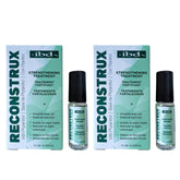 IBD Reconstrux nail repair bottle with brush for daily strengthening.