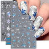 IDDFEVE gradient snowflake nail stickers create a chic winter look with soft ombré blue tones.