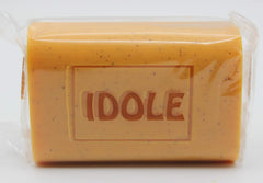 Idole Papaya Exfoliant Soap bar close-up showing texture for gentle exfoliation.