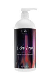 IGK Extra Love bottle pouring, suggesting volume uplift for fine hair.