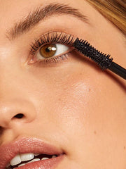 ILIA Fullest Volumizing Mascara brush with dense bristles emphasizes root-to-tip definition.