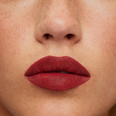 ILIA Lip Sketch Hydrating Crayon soft-matte finish on lips with long-wearing color.