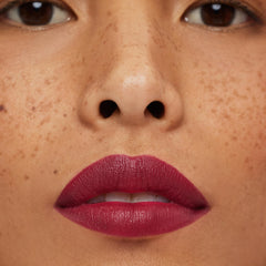 ILIA Lip Sketch Night Bloom demonstrates defined, plump-looking lips after wear.